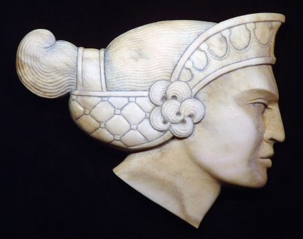 'Greek Woman in Profile' (carved and stained moose antler) by Maureen Morris