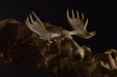 Moose and Wolves (mammoth tusk) by Dmitry Gorodetsky