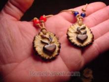 Jack Browns carved 'Love Seeds' necklaces